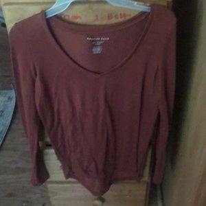 A red long sleeve blouse